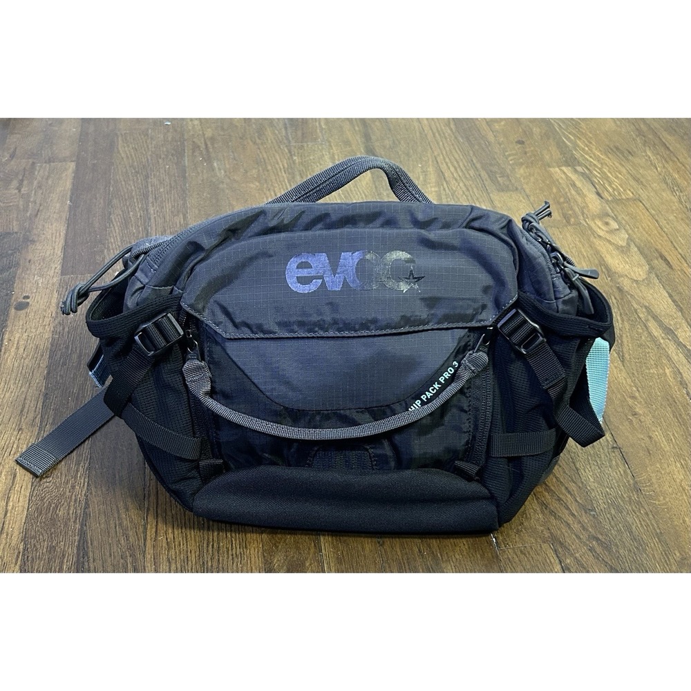 the EVOC Hip Pack Pro 3 in black durable grid-pattern fabric Gorp Core Hiking